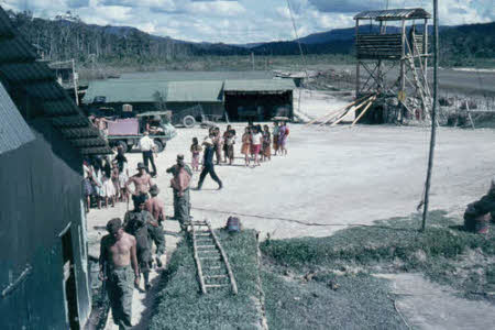 Local children and Servicemen at Bareo